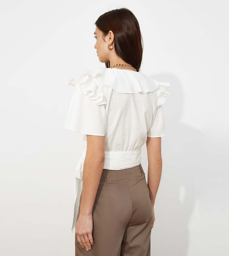 Translucent Ruffled Cropped Blouse Buy Trendyol Ruffled Crop Blouse In Beige | 6thStreet Qatar