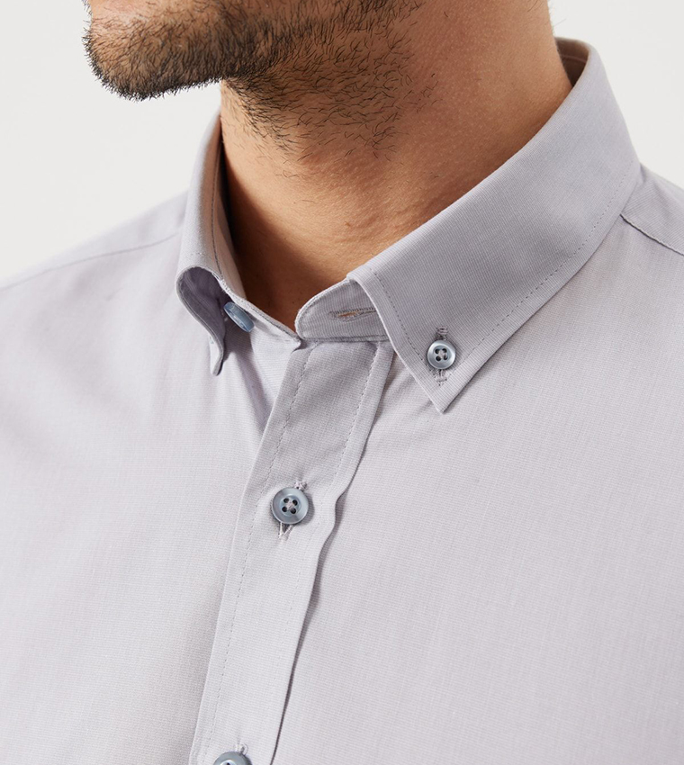 قميص بياقة بأزرار منقوش