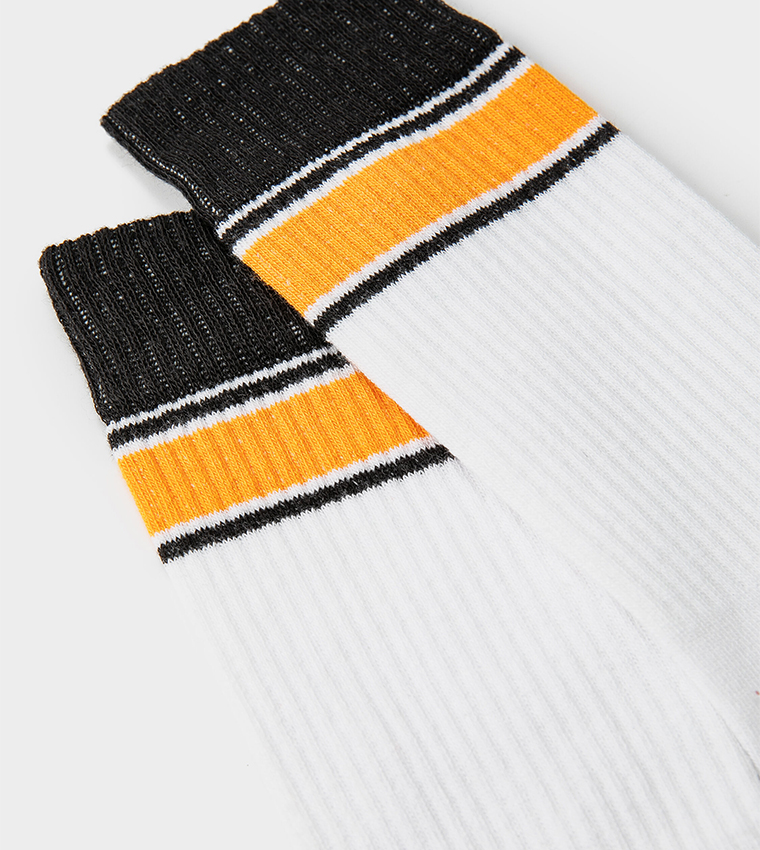 جوارب بطول الكاحل بحواف مخططة