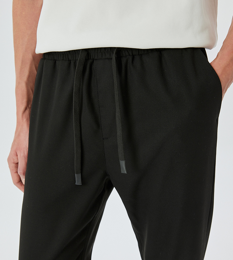 Mid Rise Tapered Fit Trousers