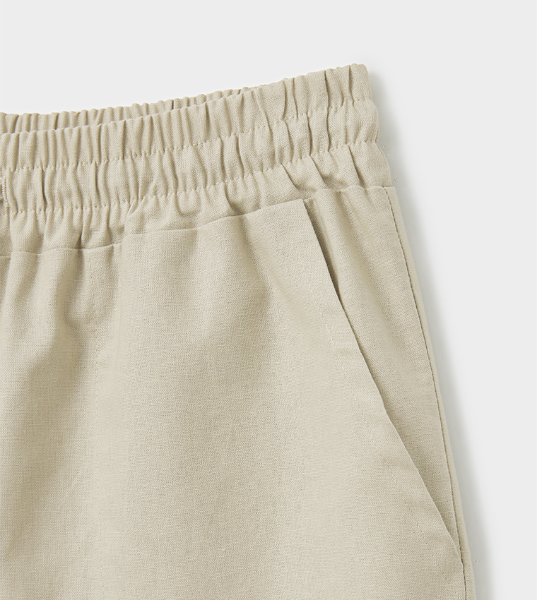 Solid Elastic Waist Tapered Fit Trousers