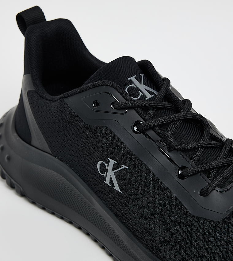 EVA Monogram Printed Runner Sneakers