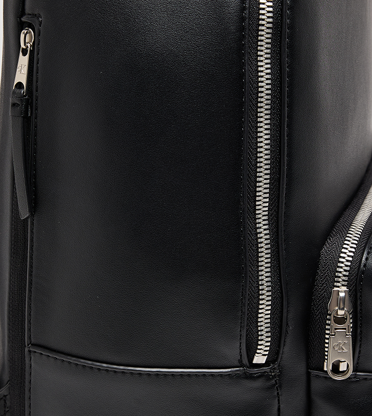 Monogram Embossed Backpack