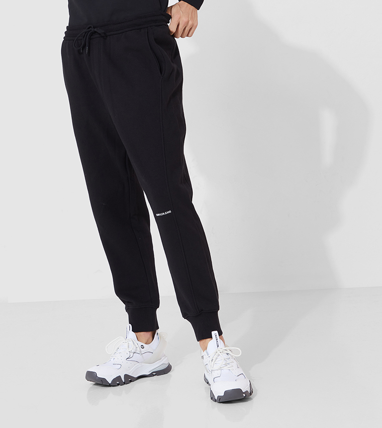 TRACK PANTS WITH MESH 4BAR for Men - Thom Browne sale | Biffi
