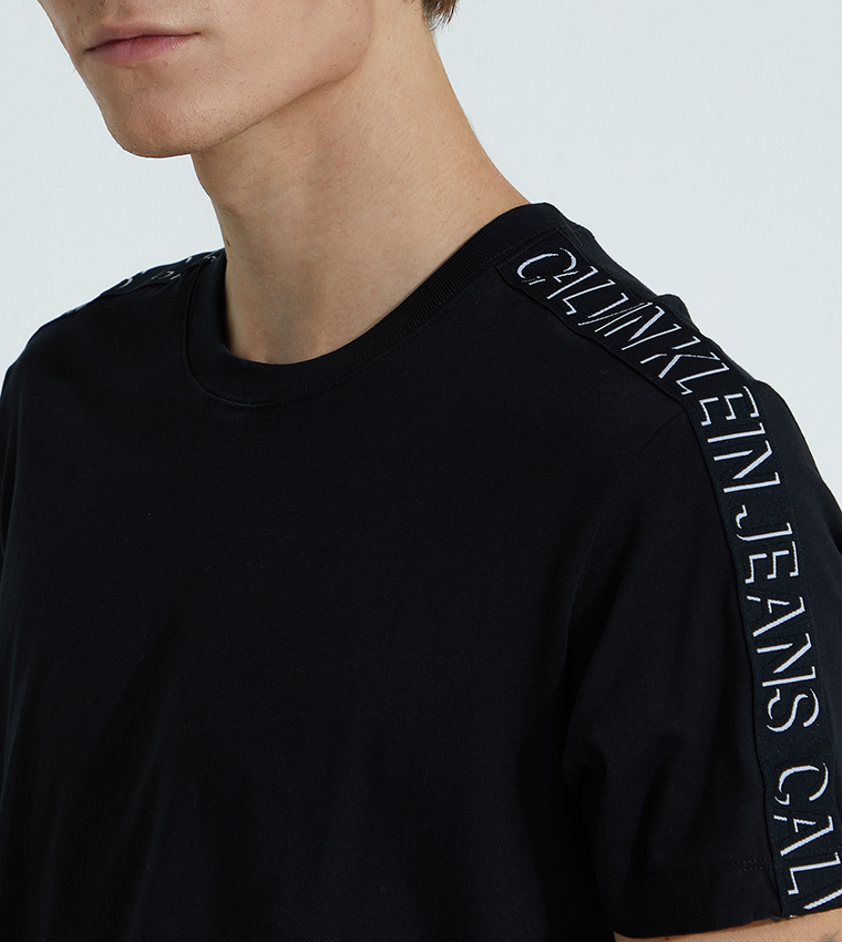 Buy Calvin Klein Logo Tape T Shirt In Black | 6thStreet UAE