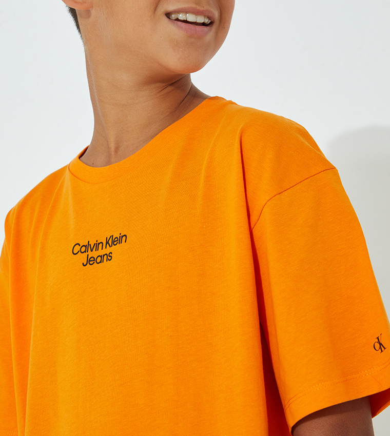 Buy Calvin Klein Stacked Logo 6thStreet Shirt Printed Orange Bahrain | In T