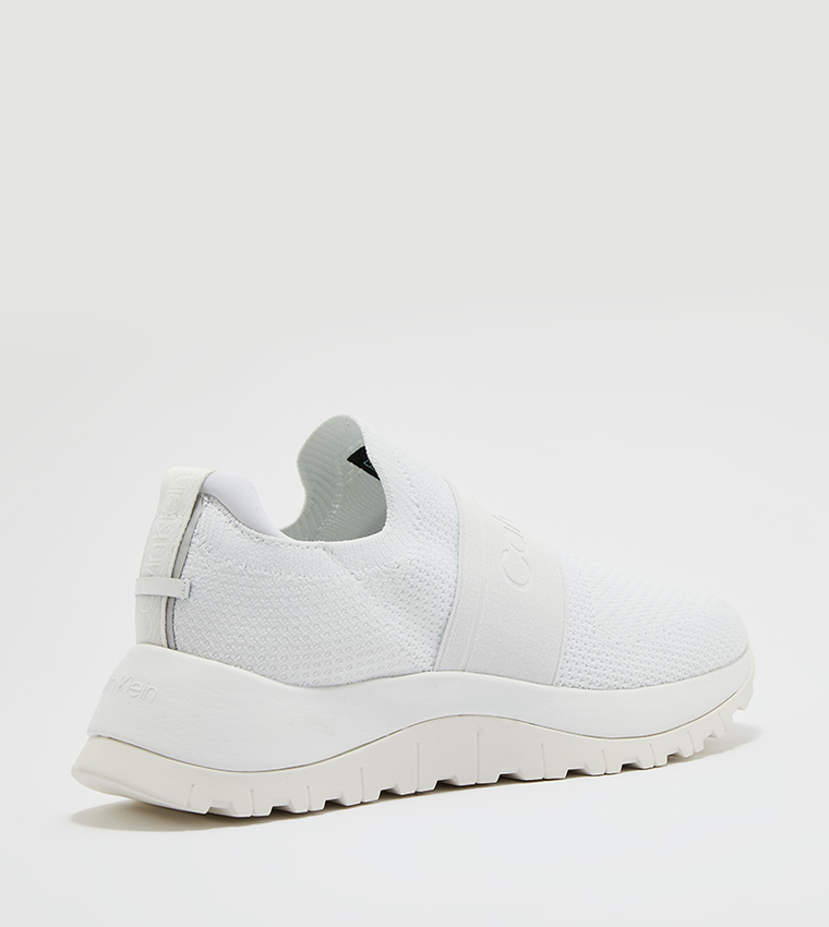 Calvin klein white slip hotsell on shoes