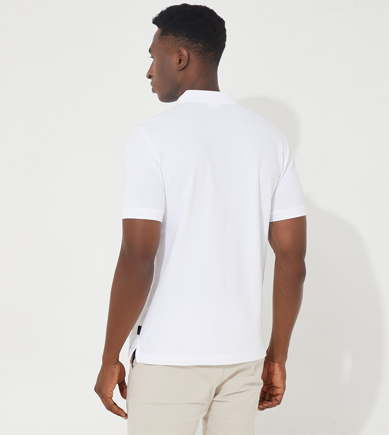 Buy Calvin Klein Liquid Touch Slim Polo T Shirt In White | 6thStreet Oman