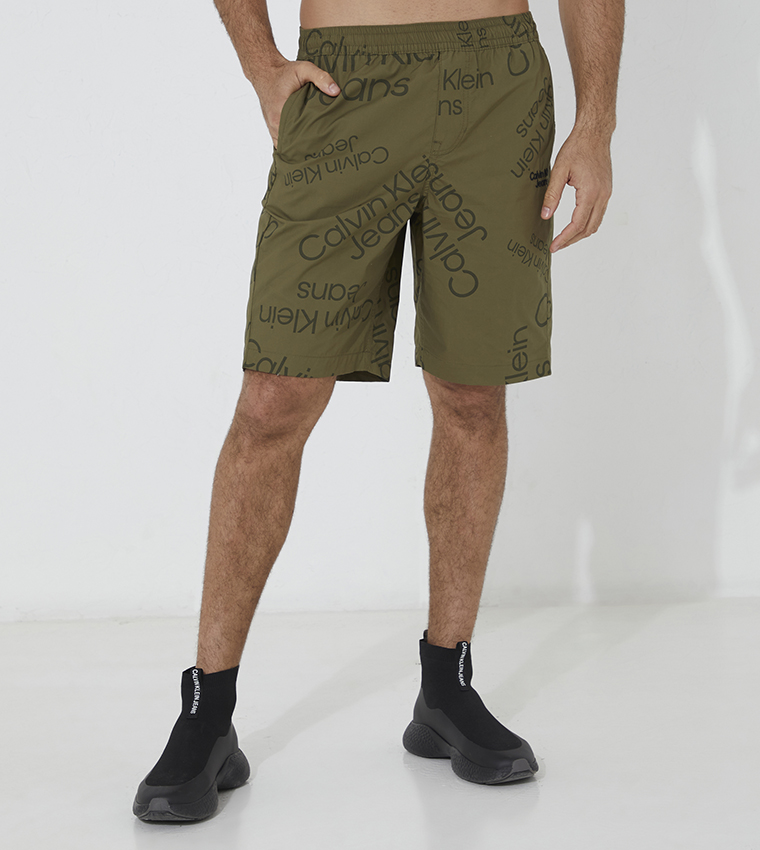 Buy Calvin Klein Logo All Over Print Shorts In Green | 6thStreet Qatar