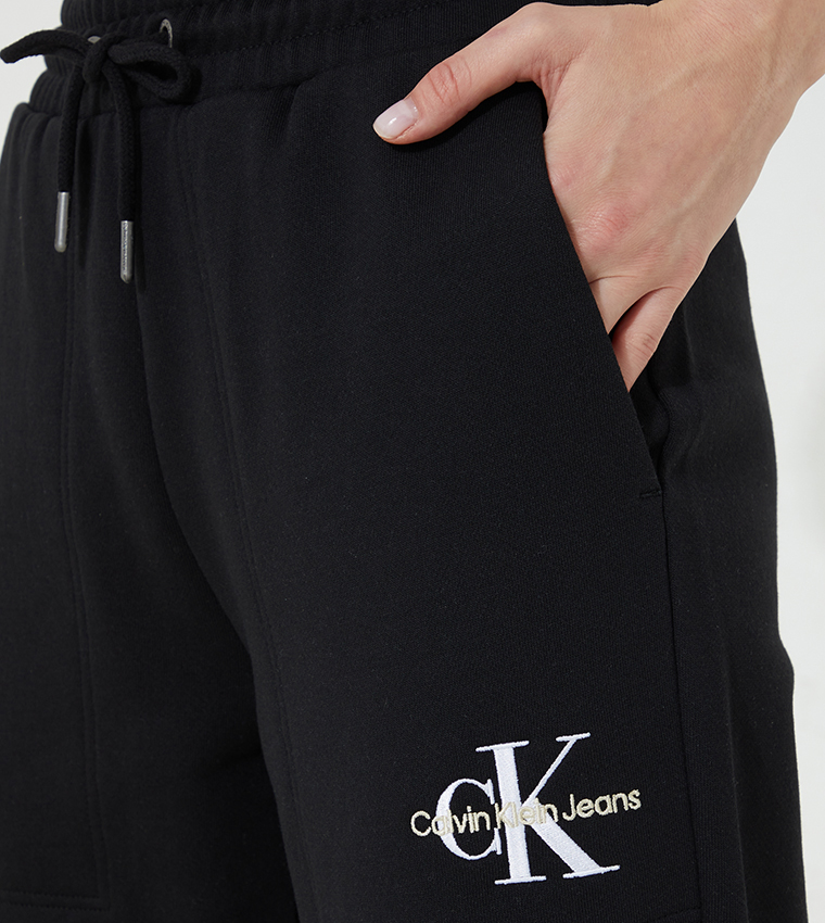 Monogram logo outlet drawstring fleece joggers