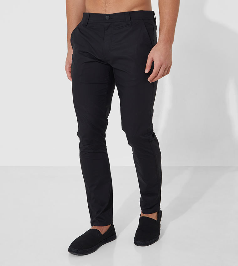 Buy Calvin Klein Skinny Washed Stretched Chinos In Black | 6thStreet Qatar