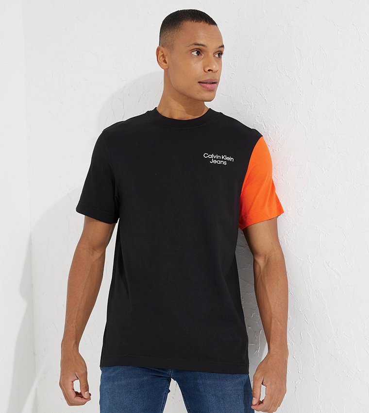 Buy Calvin Klein Stacked Logo Printed T Shirt In Black | 6thStreet Bahrain