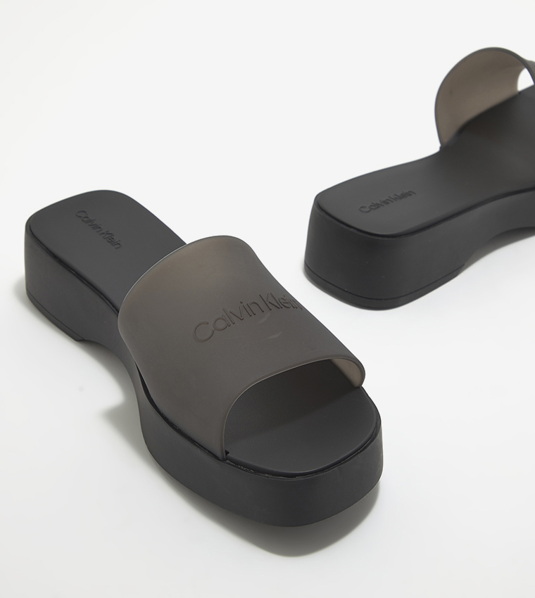 Buy Calvin Klein Open Toe Transparent Wedge Slides In Black