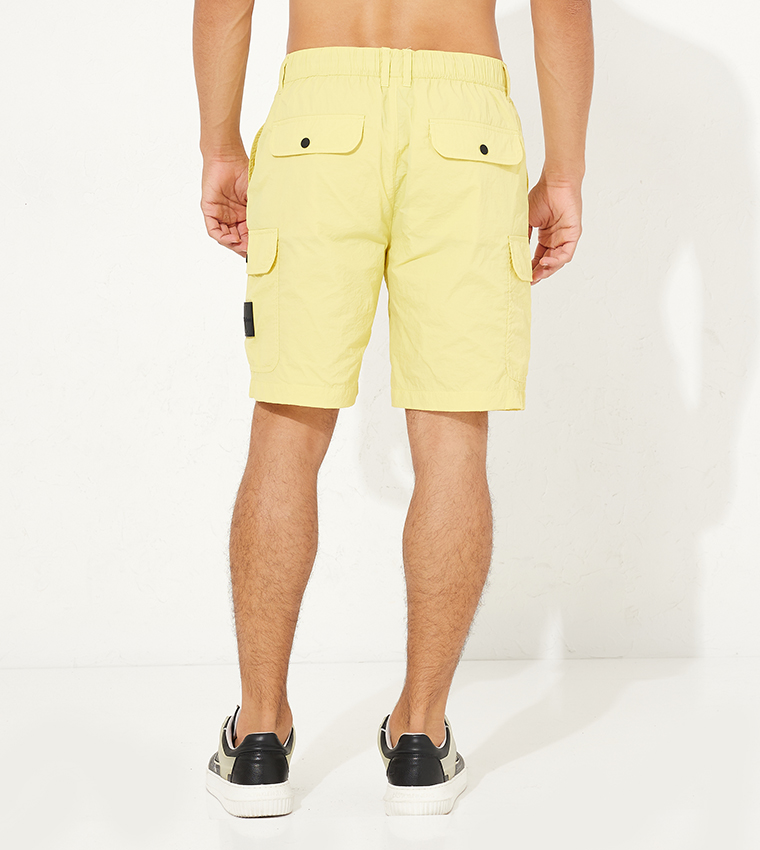 Yellow cargo store shorts