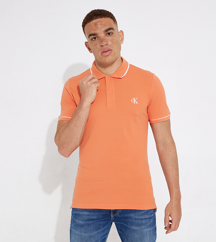 Orange polo style discount shirts