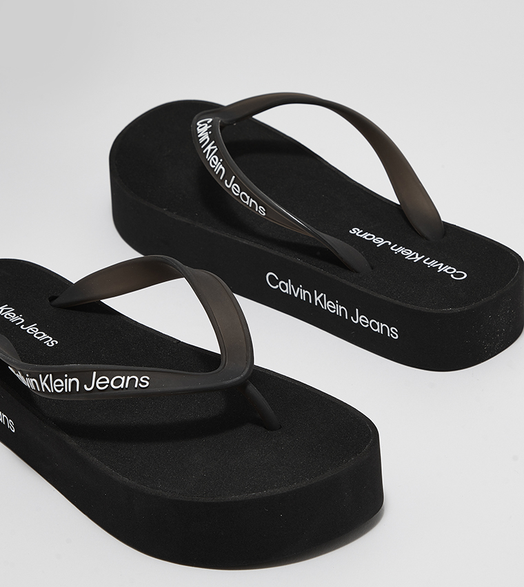 Calvin klein flip store flops womens black