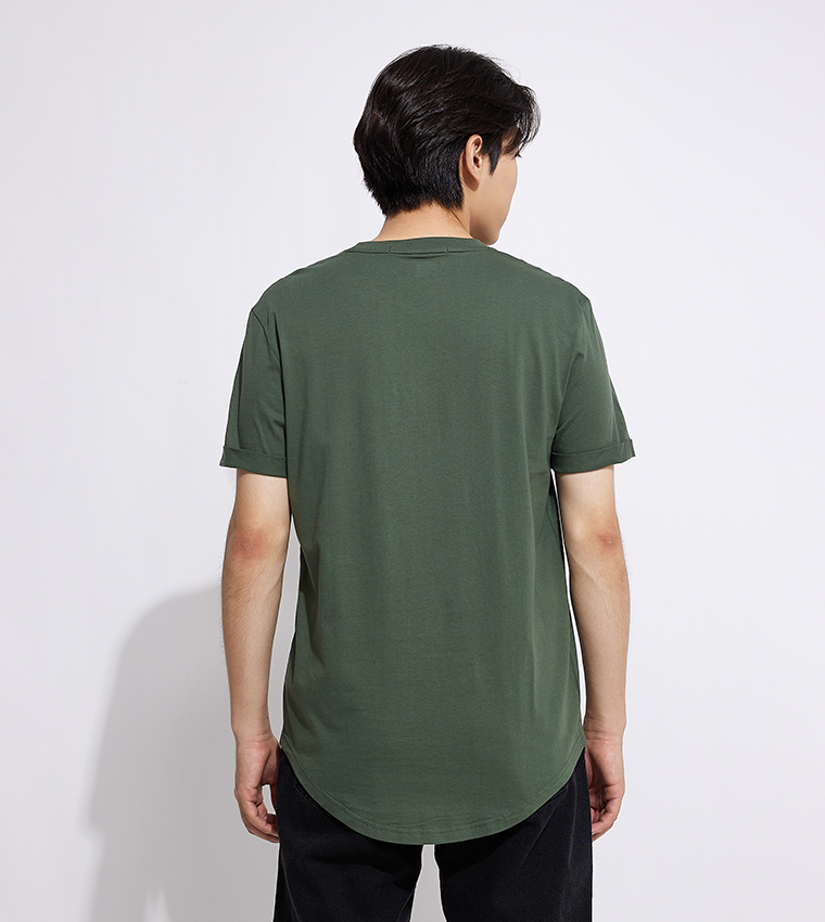 Green t store shirt with jeans