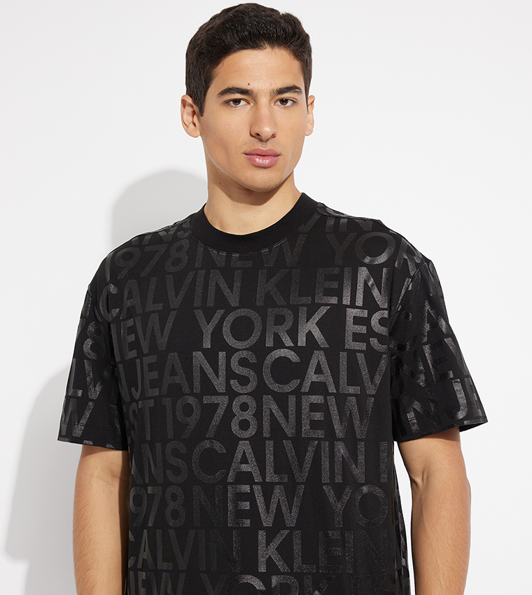 Buy Calvin Klein Jeans Logo All Over Printed Short Sleeves T Shirt In Black 6thStreet Saudi Arabia