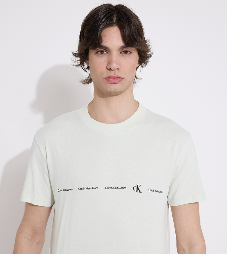 Buy Calvin Klein Logo Printed Crew Neck T Shirt In White 6thStreet Oman