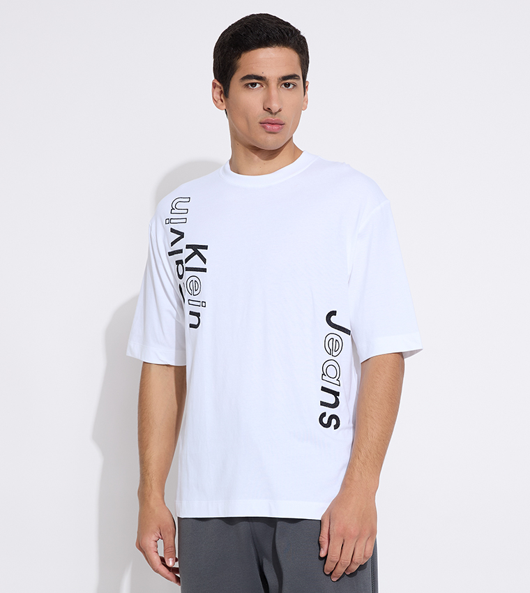 Buy Calvin Klein Jeans Logo Embroidered Short Sleeves T Shirt In White 6thStreet Kuwait