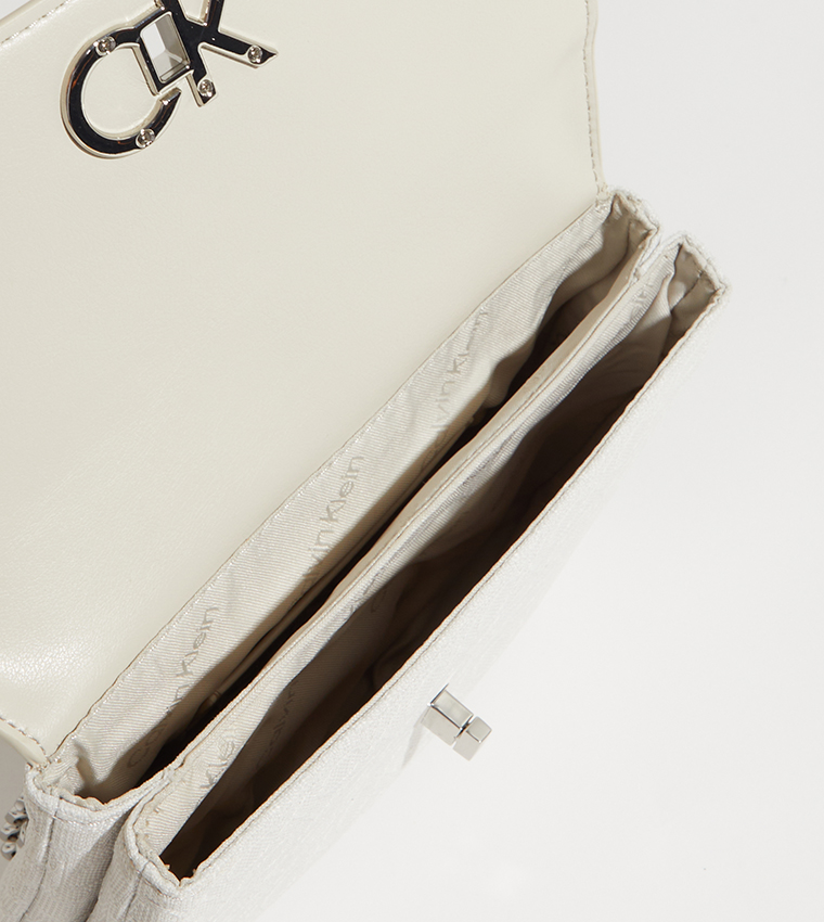 Buy Calvin Klein Re Lock Double Guset Crossbody Bag In Beige