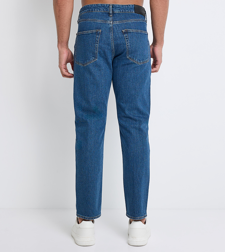 Washed Tapered Fit Jeans