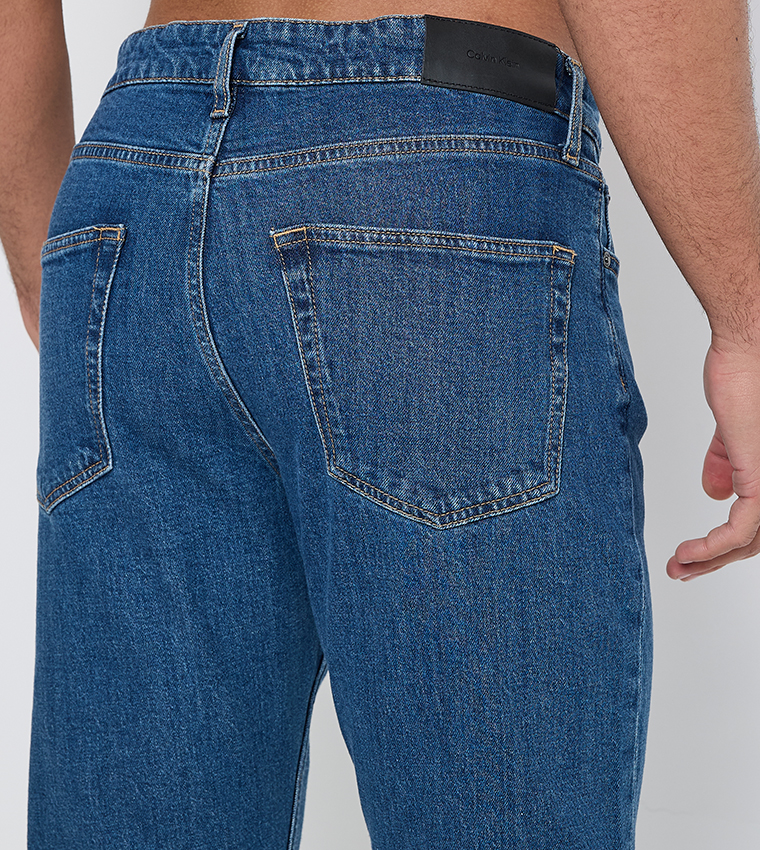 Washed Tapered Fit Jeans