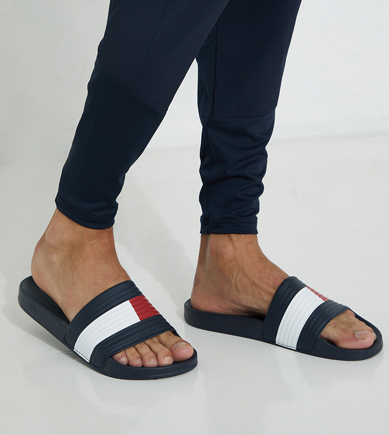 Buy Tommy Hilfiger Embossed Flag Pool Slides In NAVY BLUE 6thStreet UAE