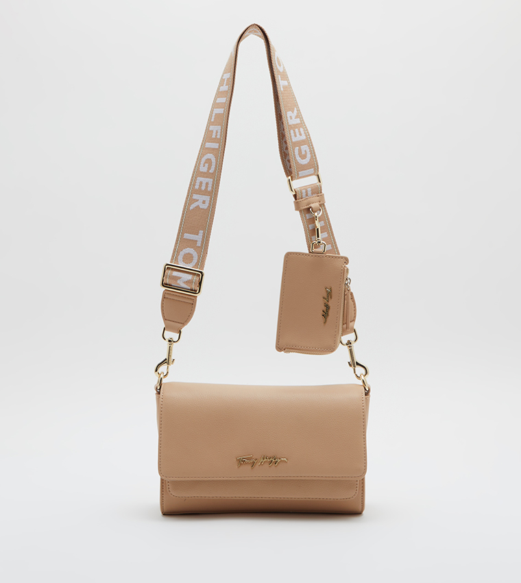 Buy Tommy Hilfiger Brand Strap Crossbody Bag In Beige 6thStreet UAE