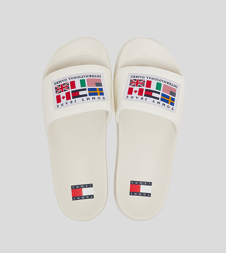 Buy Tommy Hilfiger Archive Games Pool Slides In Off White 6thStreet Bahrain