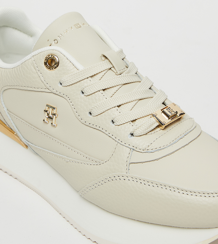 Buy Tommy Hilfiger Logo Metal Lace Up Sneakers In Beige