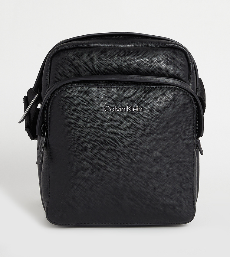 Buy Calvin Klein Textured Logo Detail Reporter Bag In Black 6thStreet Oman