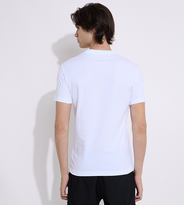 Buy Calvin Klein Logo Printed Crew Neck T Shirt In White 6thStreet Qatar