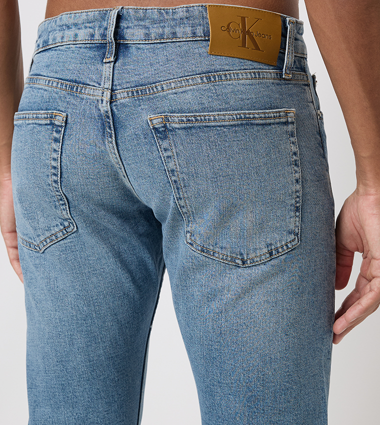 Faded Mid Rise Slim Fit Jeans