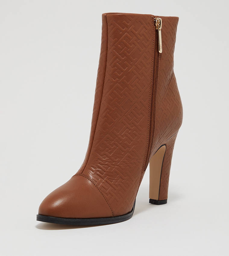 Buy Tommy Hilfiger Monogram Patterned Zippered Heel Boots In Brown