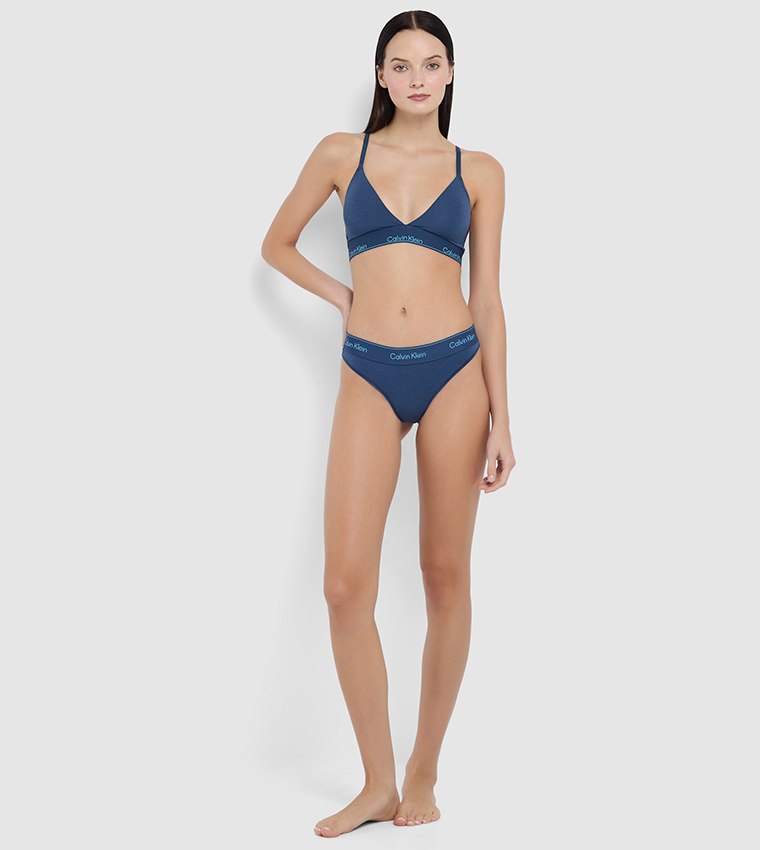 صدرية مثلثة مبطنة خفيفة بخصر مرن بشعار