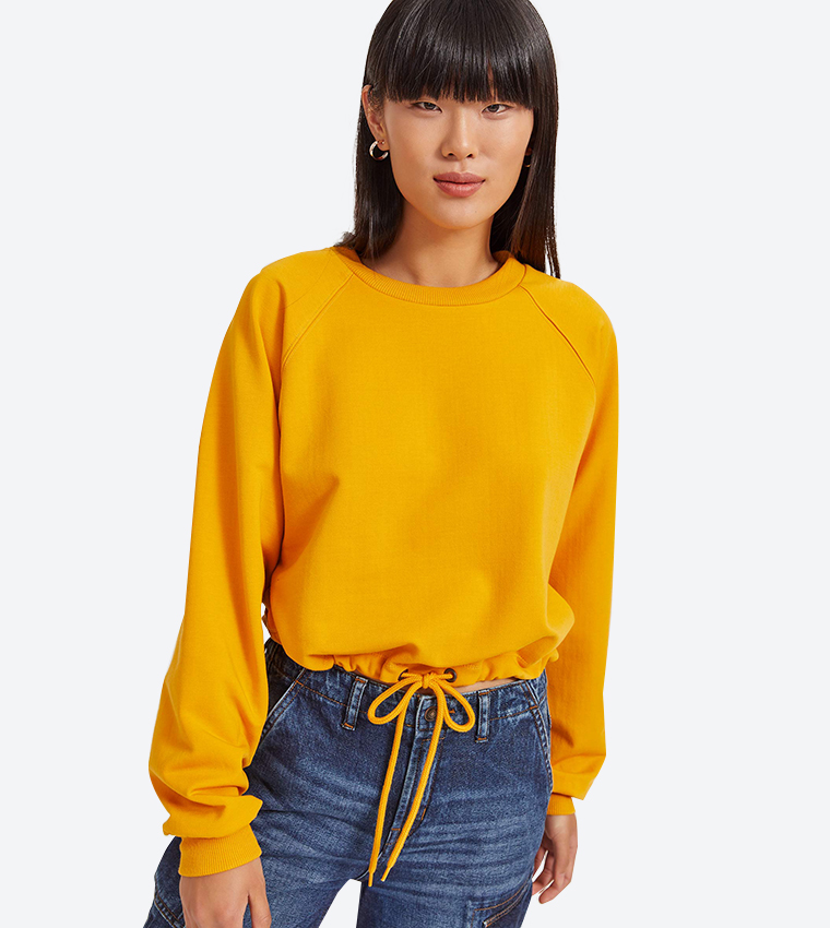 Buy Ardene Long Sleeve Drawstring Waist Sweatshirt Yellow In Yellow 6thStreet Oman