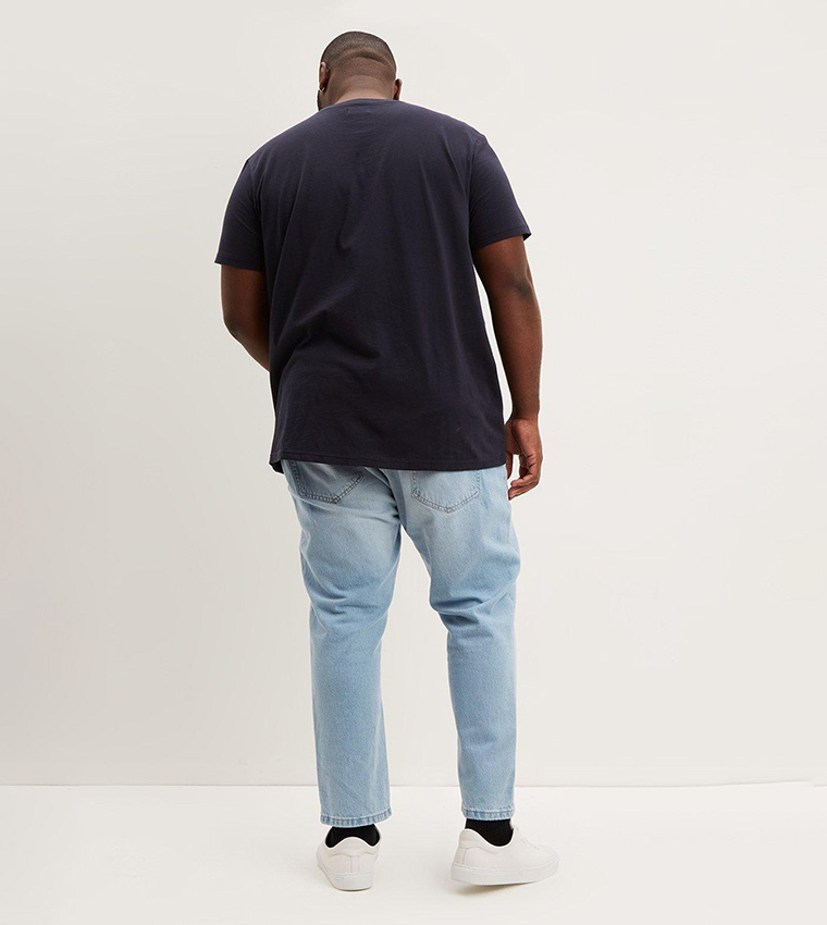 Buy Burton Loose Fit Tapered Jeans In Blue 6thStreet Oman