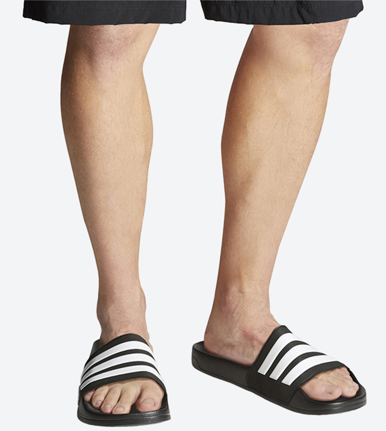 Buy Adidas Adilette Shower Round Toe Sliders Black In Black | 6thStreet  Bahrain