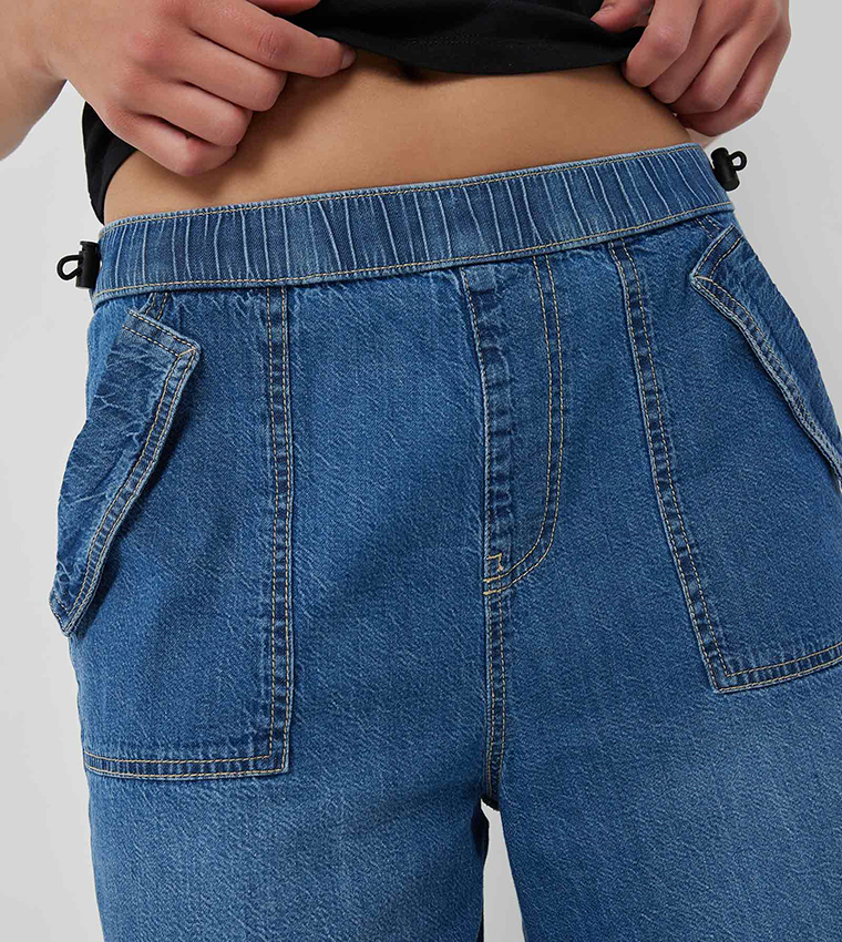 Faded Low Rise Parachute Jeans