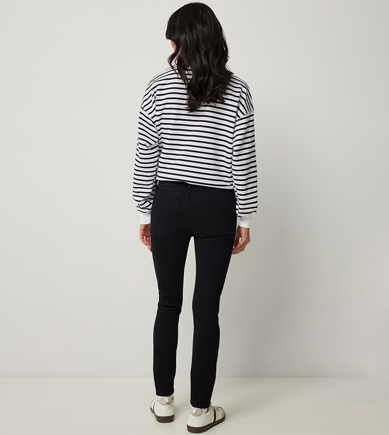 Washed Mid Rise Jeggings