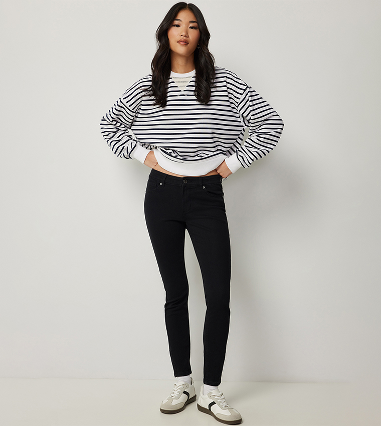 Washed Mid Rise Jeggings