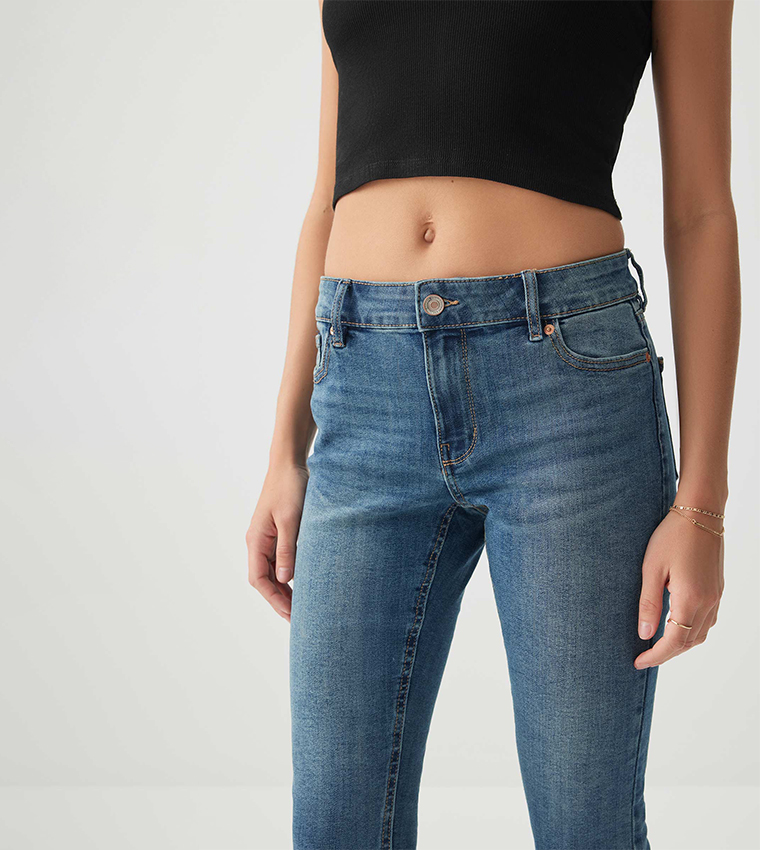 Faded Mid Rise Capri Jeans