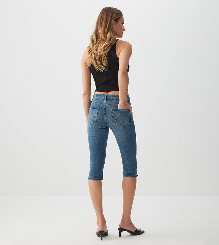 Faded Mid Rise Capri Jeans