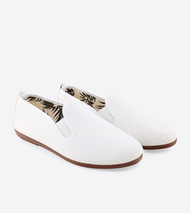 White Flossy Slip Ons Buy Flossy Arnedo White Slip Ons In White 6thStreet  Saudi Arabia