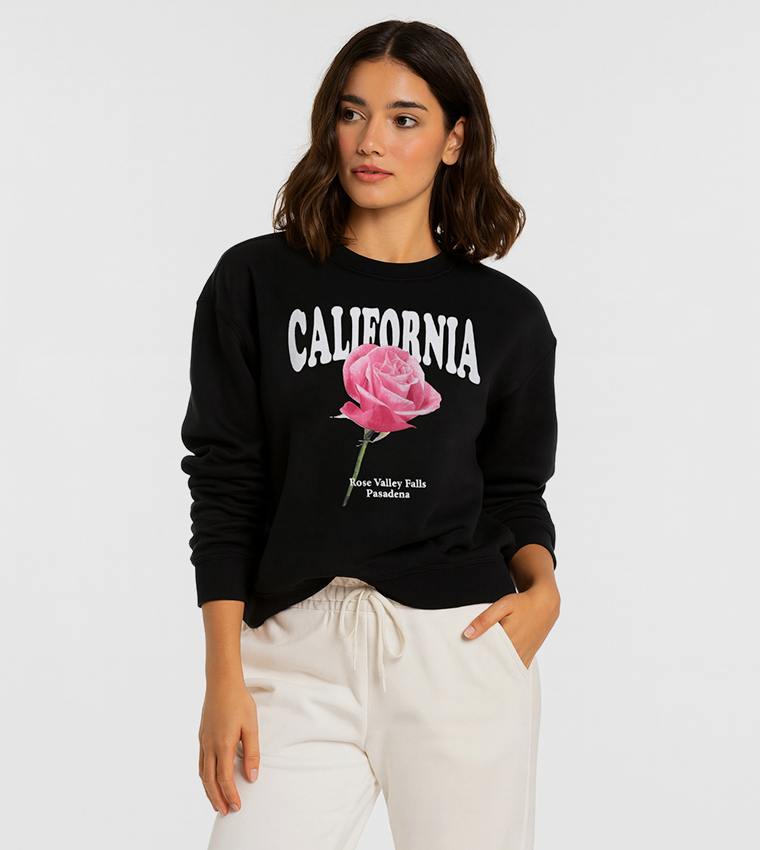 سويتشيرت قطن فليس بطبعة ورقبة مستديرة 