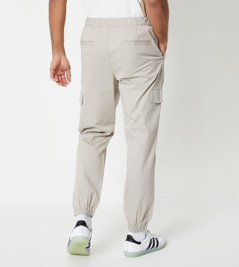 Buy Burton Solid Chino Joggers In Khaki 6thStreet Qatar