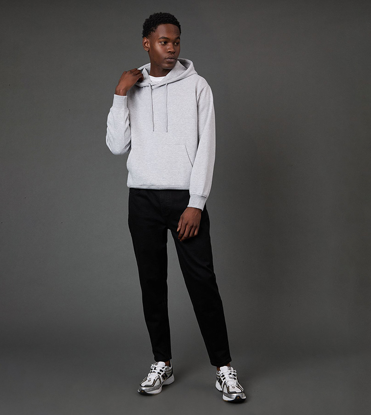 Solid Stretch Tapered Fit Jeans