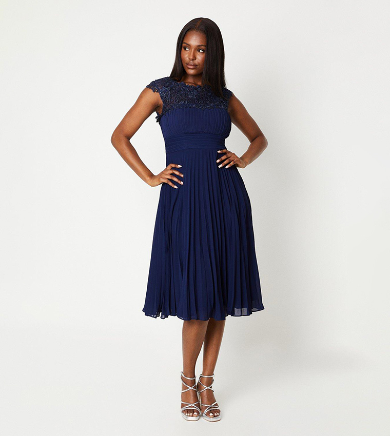 Lace dress with pleated skirt hotsell