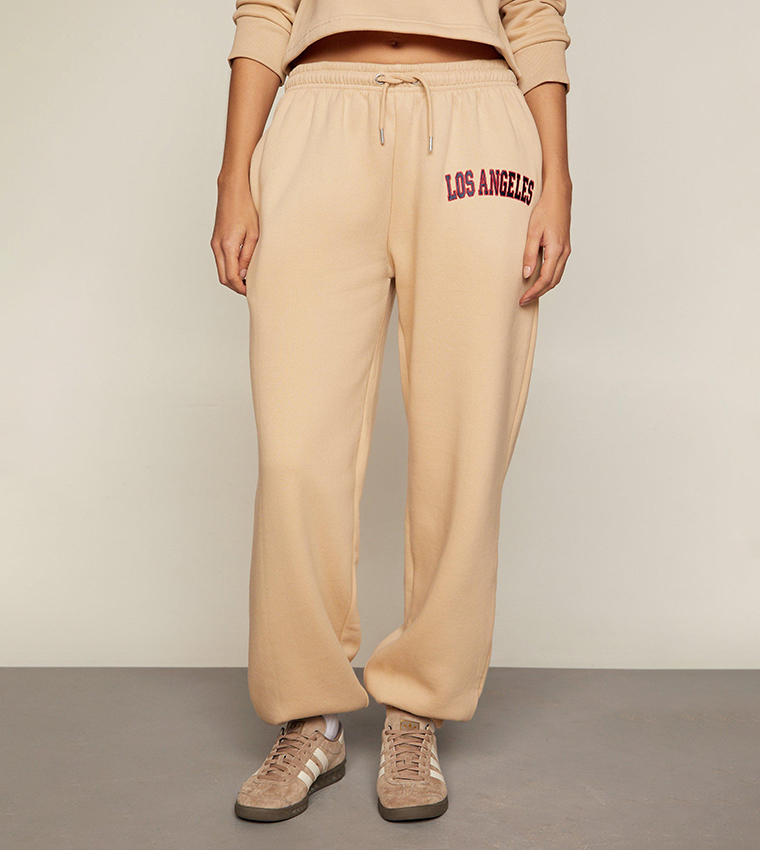 Buy Nasty Gal Los Angeles Oversized Mid Rise Joggers In Beige